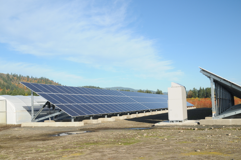 Grid-tie solar array powers our greenhouses